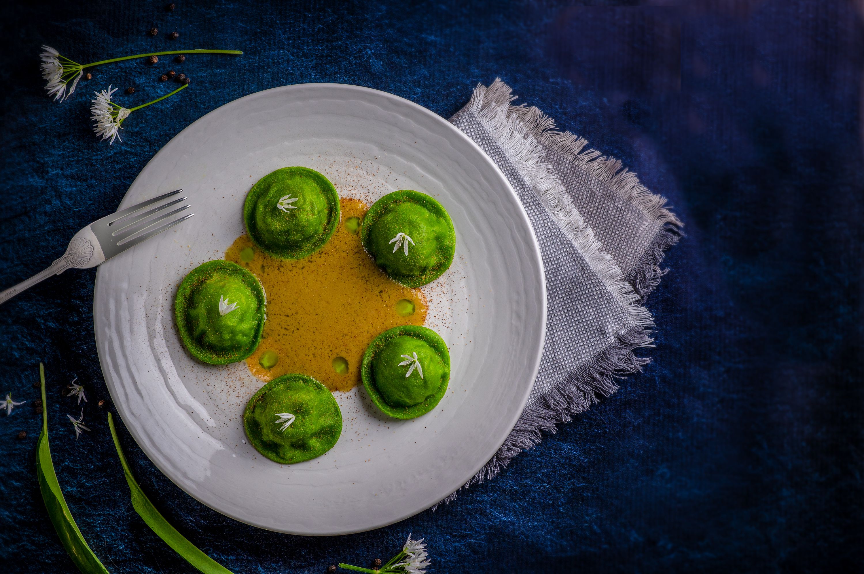 green ravioli on plate